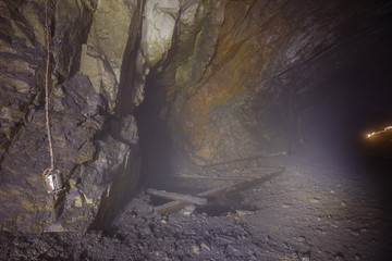 Vertical raise with fog at underground gold mine