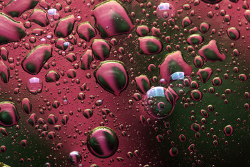 abstract background - waterdrops on orange and green background. Horizontal image