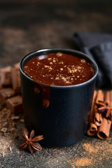 Delicious winter drink spicy hot chocolate with cinnamon and anise.