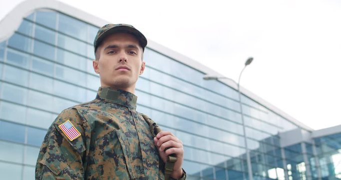 Soldier in american uniform looking into the camera.