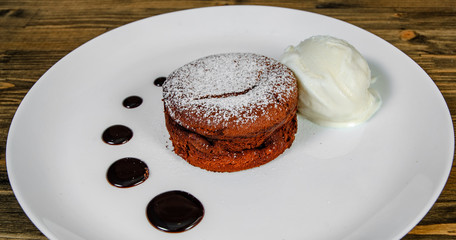 chocolate fondant on a wooden background.