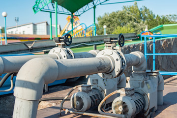 Fototapeta na wymiar Pipeline and pump station for pressurized water.