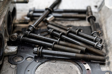 car engine Assembling of vehicle engine parts on the table.