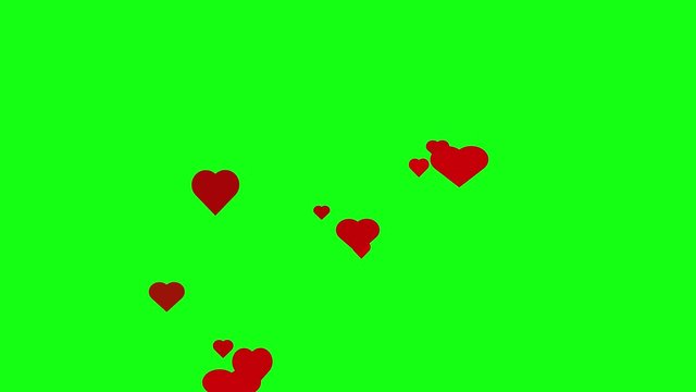 Red heart symbol animation falling on green screen background in 4k resolution