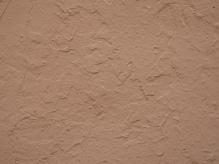 textured brown cement wall
