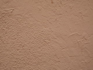 textured brown cement wall