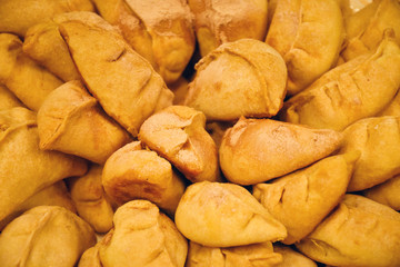 Traditional Asian cuisine – homemade pastry filled with chicken meat (selective focus)
