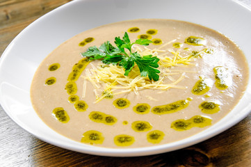 mushroom cream soup on wooden board