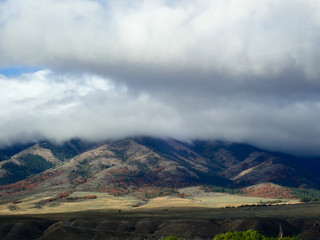 Fototapeta premium Mountain with cloud above