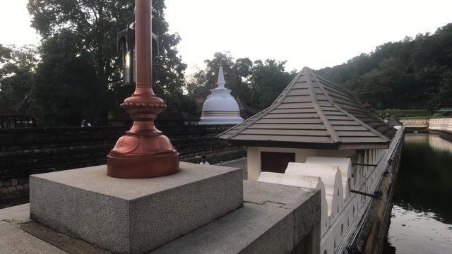 Kandy, Sri Lanka, November 25, 2019, Sri Dalada Maligawa along the wall and Dagoba in the temple 4K