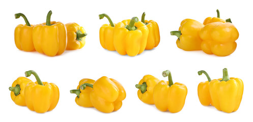 Set of ripe yellow bell peppers on white background