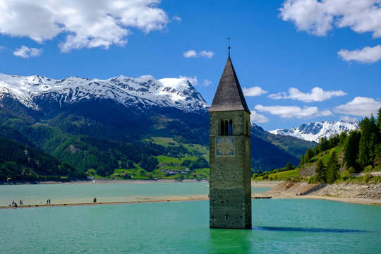 Italy, South Tyrol, Vinschgau, Tower of church sunken in Lake Reschen