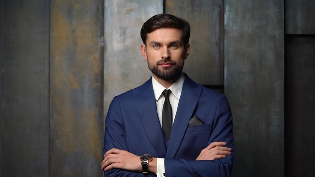 full hd video of young handsome stylish businessman wearing suit