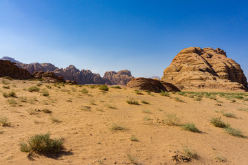 Vintage photo from the archive. May 2011 Wadi Rum Desert. Jordan. Martian landscapes in the lifeless desert of Wadi Rum. Red rocks and red sand. Location of the movie Lawrence of Arabia.