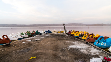 Abandoned pedal boats by Maharloo pink lake, Shiraz, Iran