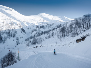 Mountain peaks of the Caucasus at Krasnaya Polyana, the village Rosa Khutor, winter sports resort of Sochi, Krasnodar Krai, Russia