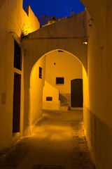 Night view of the old streets in the Tetouan Medina quarter in Northern Morocco. A medina is...