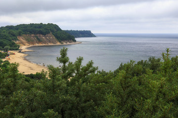 Obraz premium View of the cliffs and a beautiful cove on the Baltic Sea.