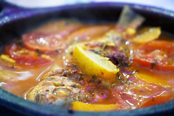 Tajine with stewed vegetables and fish. One of the types of Moroccan national cuisine.