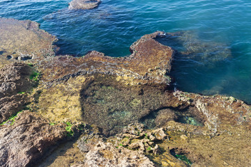 Colorful stones on the Mediterranean sea coast in the Beirut, Lebanon.