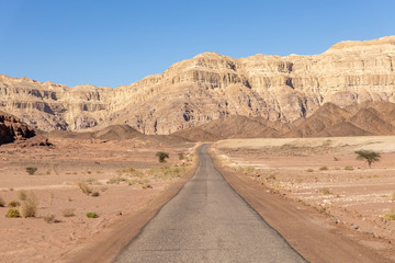 Fototapeta na wymiar Mountains and road in the desert of Arava