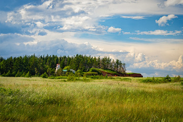 Lighthouse along the shore of rural Prince Edward Island, Canada.