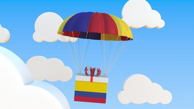 Box with national flag of Colombia falls with a parachute. Loopable conceptual 3D animation