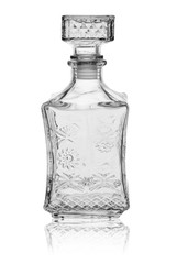 Empty square-shaped glass decanter, closed with a glass stopper. On a white background with...