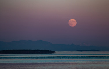 Pacific NW Puget Sound: Moonrise from Sucia Island in the San Juan Islands