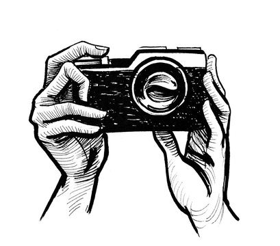 Hands holding retro analog camera. Ink black and white drawing