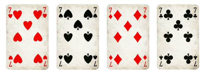 Four Vintage Playing Cards Isolated on White Background, Showing Seven from Each Suit - Hearts,...