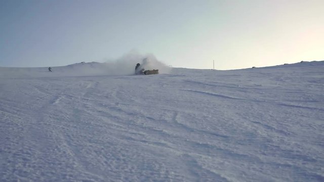 Snowboarder crashed on a ski slope.