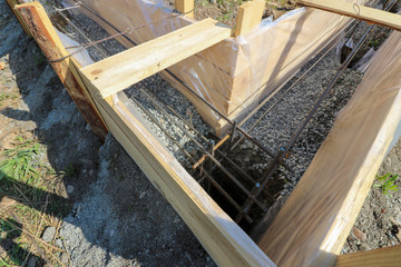 Wooden formwork for the foundation of the house, garage.