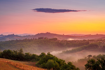 Beautiful sunrise in the Tuscany hills. Travel destination Tuscany