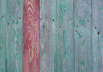Old green wood plank texture background, one of plank is red