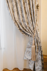 Holder for room curtains. Fragment photo curtain, interior detail, curtain detail close up,