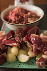 Mincer makes minced beef, pork and onions. Cooking homemade meat food