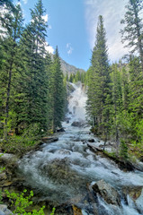 Fototapeta na wymiar Hidden Falls - waterfall in Grand Teton National Park