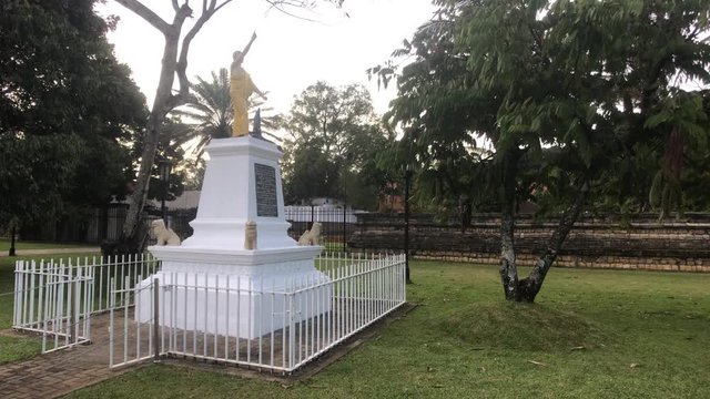 Kandy, Sri Lanka, November 25, 2019, Sri Dalada Maligawa monument on the grass lawn in the temple 4K