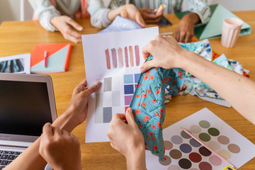 Fashion designers having a meeting in office