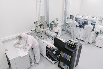 Team of scientists working in laboratory of technology center