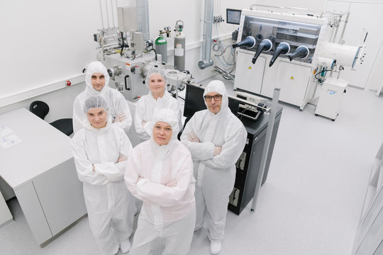 Portrait of confident team of scientists in laboratory