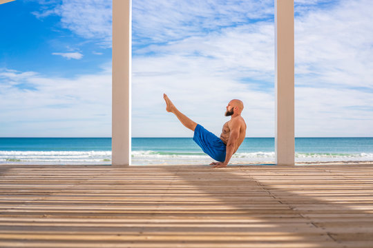 Sportsman training at the beach