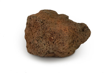 Basalt stone isolated on white background. Basalt is Extrusive igneous rock or Volcanic Rock. Basalt has a fine texture. Dark or gray to black, brown to heavy and mostly porous.