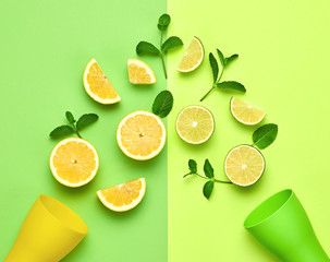Citrus orange lemon Fresh Fruit with mint leaves. Vegan juice Organic Food Concept. Creative colorful Layout. Flat lay. Trendy fashion Style. Minimal Art. Summer Bright Color.