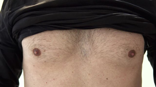 chest of caucasian man breathing