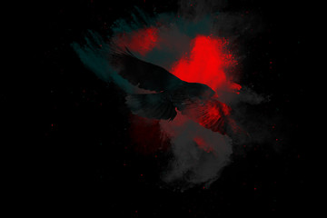 Flying bird. Dispersion, splatter effect. Black background. 