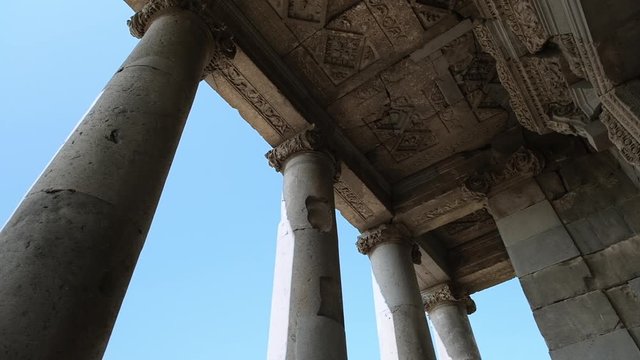 panorama of the columns of the ancient Armenian temple of Garni. view of the ceiling at the entrance to the temple