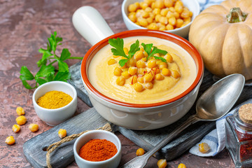Spicy pumpkin cream soup with chickpeas.