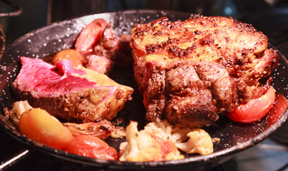 Selective Focused Medium Rare barbecue grill roasted Beef with seasoned sauce, ready for healthy meal in Hotel Buffet Food Line. Hearty Dinner Meal, Cuisine, Culinary, Gourmet and Catering concept
